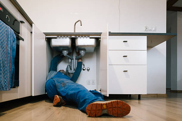 Professional Drain Cleaning technician working in Windsor Heights, IA